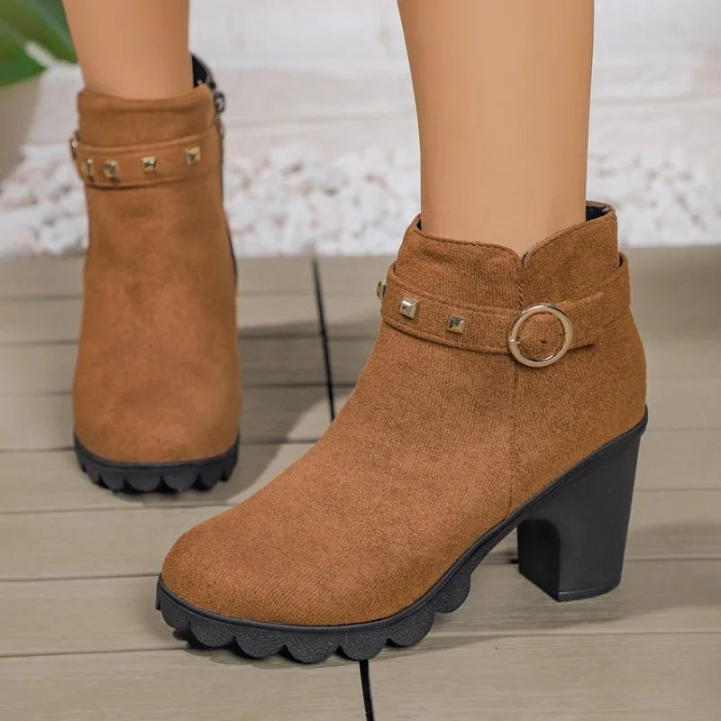 Durable women's studded block heel winter boots, offering comfort and style.