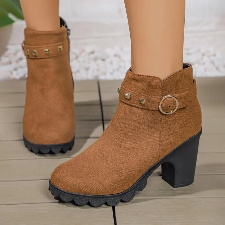 Durable women's studded block heel winter boots, offering comfort and style.