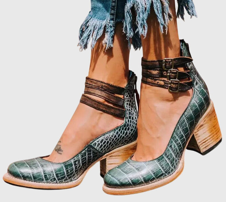 Everyday fashion women's ankle boots with a stylish buckle detail and comfortable block heel.