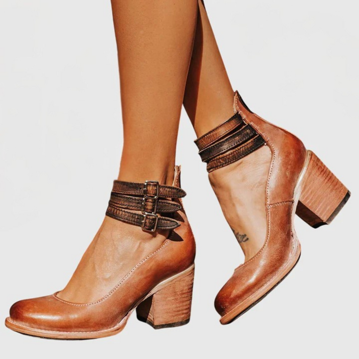Fall fashion women's ankle boots, chic buckle strap & block heel for a trendy and versatile look.