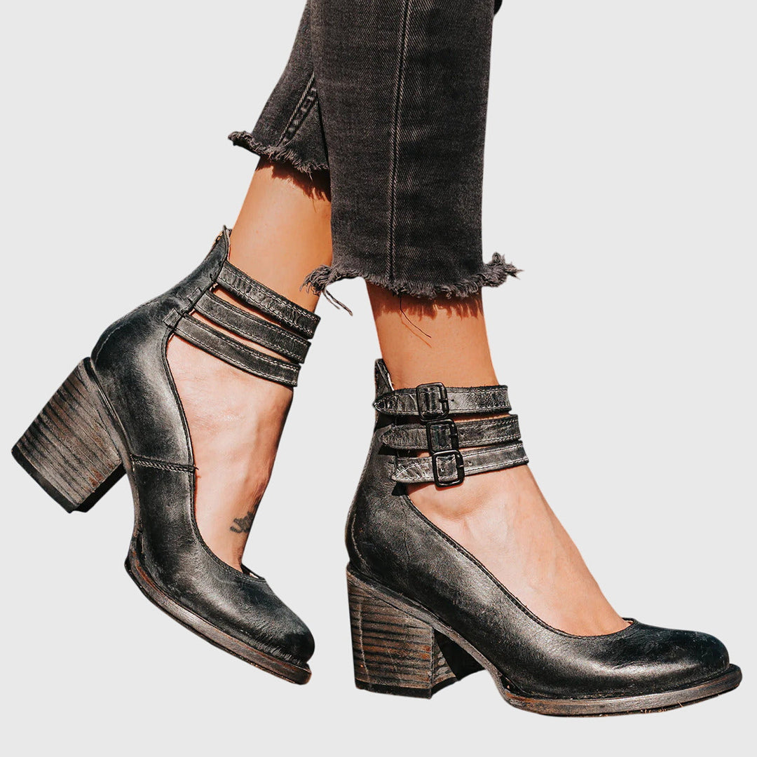 Women's versatile ankle boots featuring a buckle strap, stable block heel; great for any style.