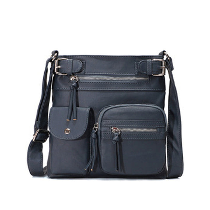 Secure zipper detail on a women's anti-theft crossbody bag, keeping belongings safe.