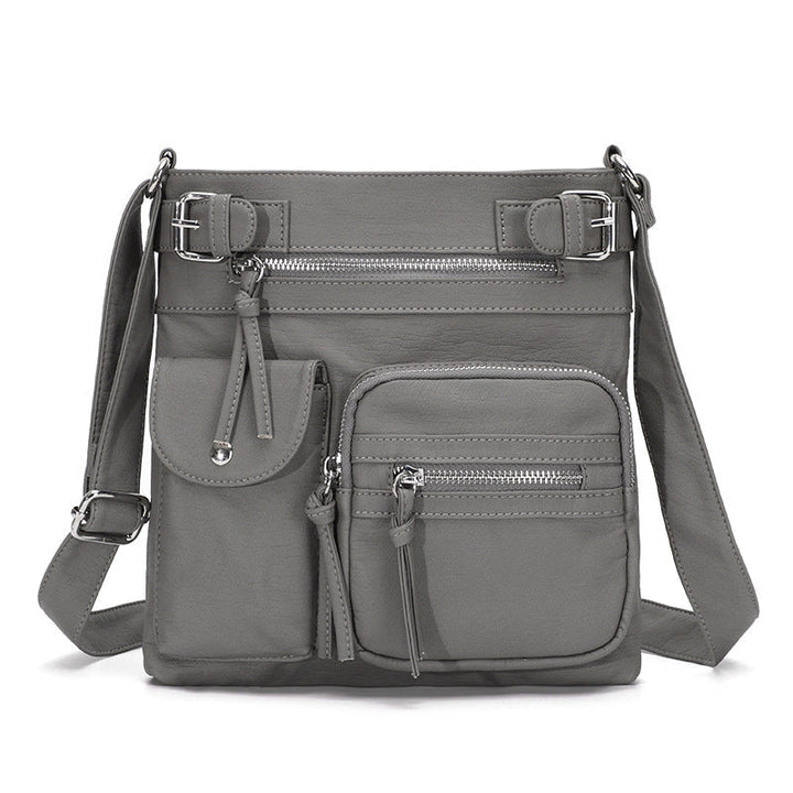 Lifestyle shot: woman enjoying her day with a stylish anti-theft everyday crossbody bag.