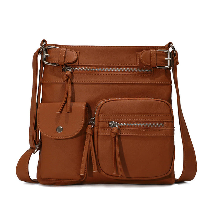 Practical security features on a women's organized anti-theft crossbody travel bag.