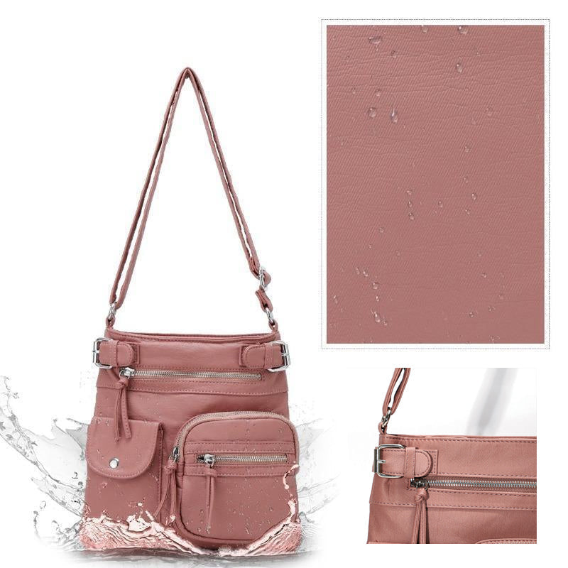 Red anti-theft crossbody bag, a stylish and secure travel purse for modern women.