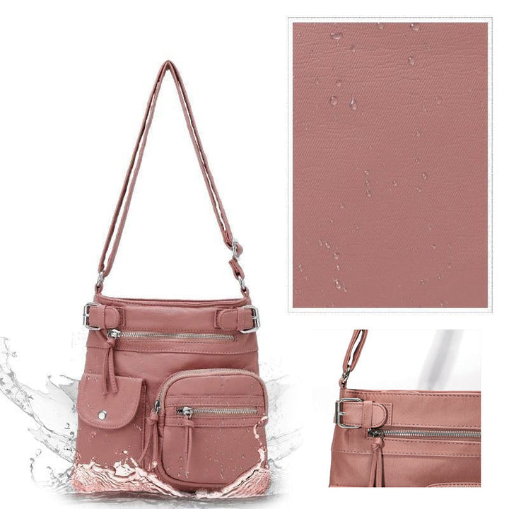 Red anti-theft crossbody bag, a stylish and secure travel purse for modern women.