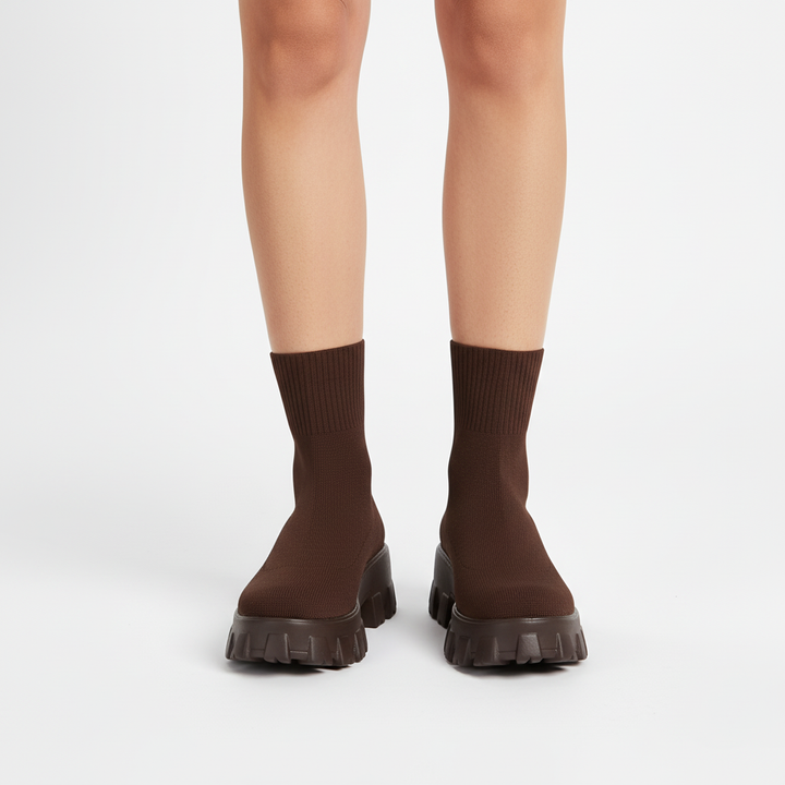 Side view of Sofia women's tread sole ankle boots, a blend of style and comfort for winter