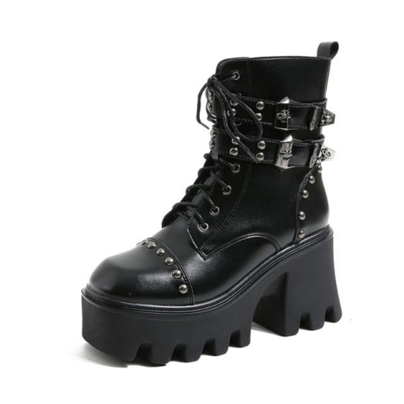 Women's stylish black platform ankle boots with a chunky heel, perfect for an edgy, trendy look.