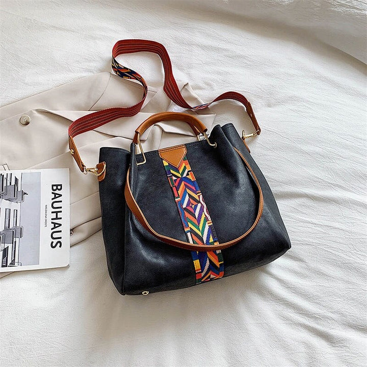 Spacious PU leather tote in a neutral tone, ideal for daily essentials