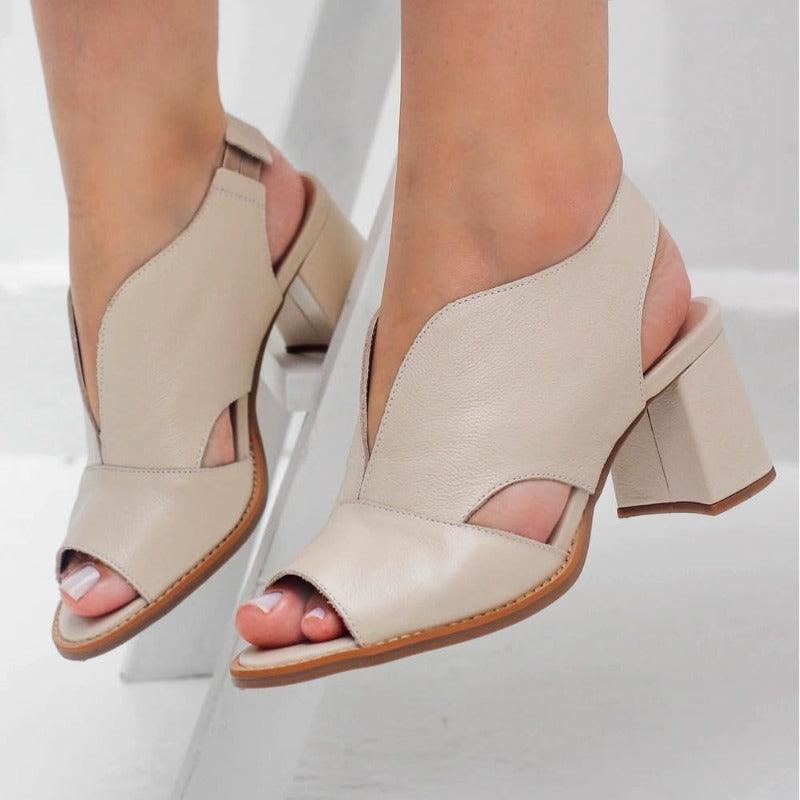 Versatile women's block heel sandals with a sturdy construction, perfect for office to evening.