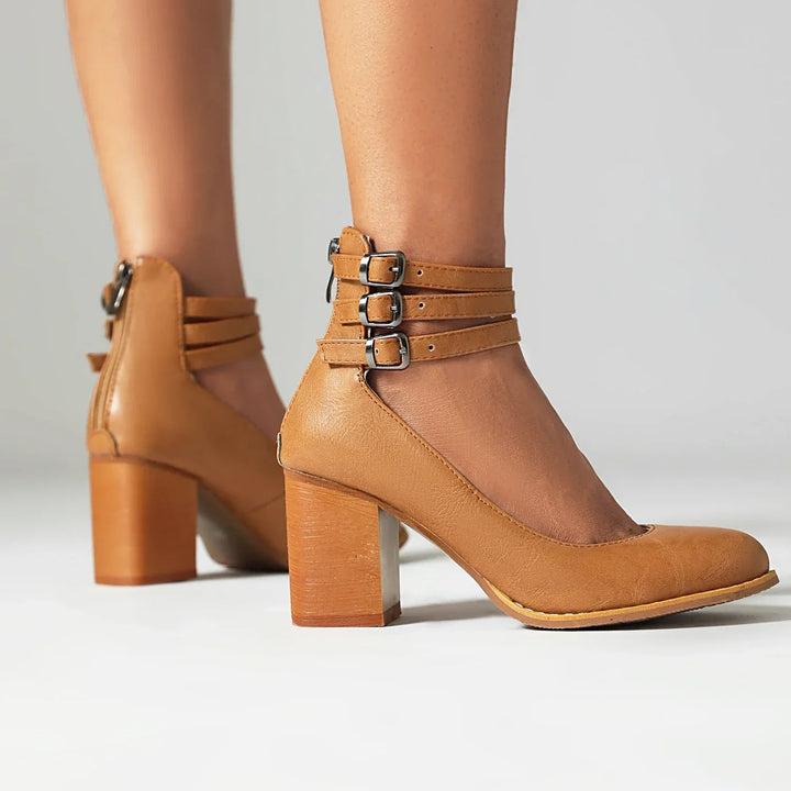 Confident women's party shoes: block heel sandals with triple ankle straps, perfect for events.