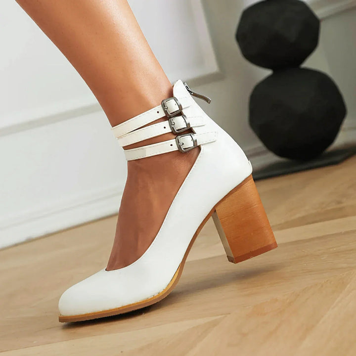 Casual yet chic women's block heel sandals, featuring stylish triple ankle straps and comfortable design.