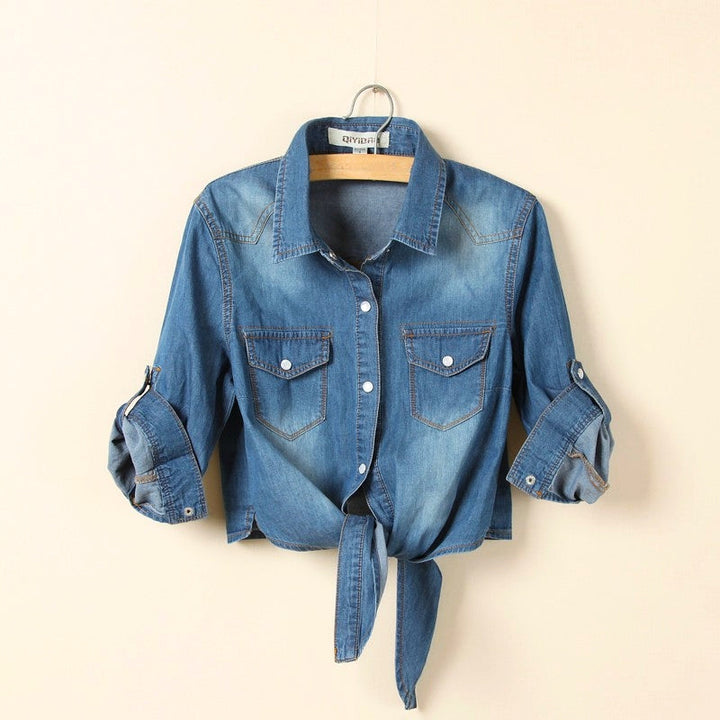 Women's stylish blue tie-front button-down shirt with long sleeves, perfect for versatile everyday fashion.