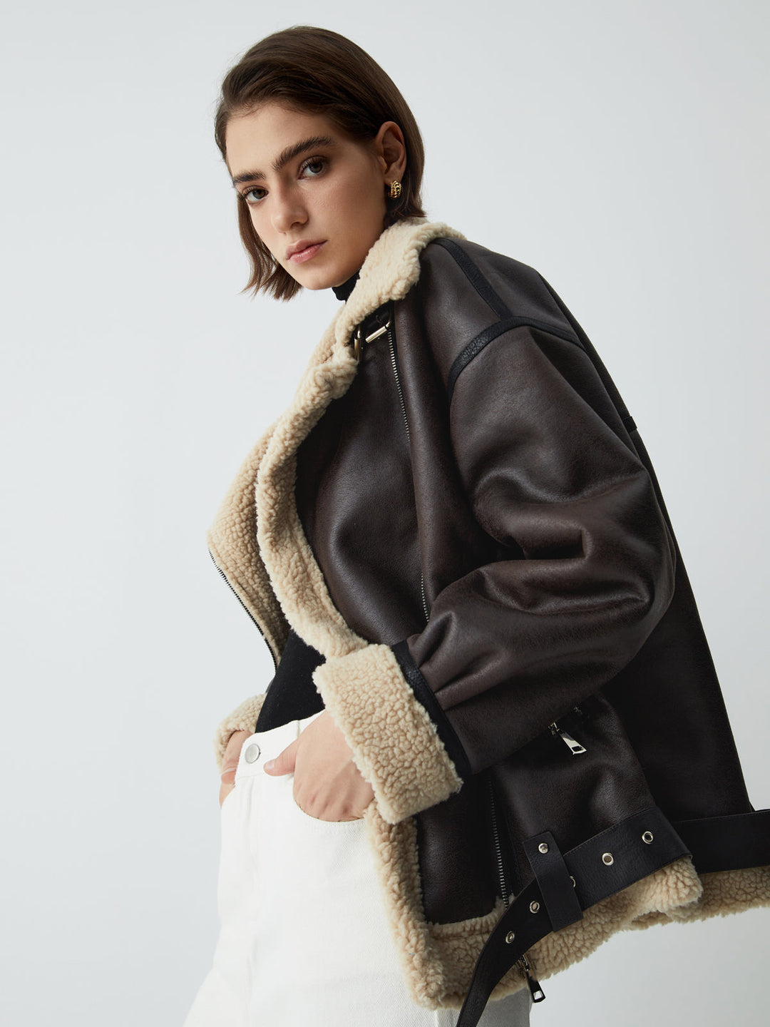 Women's stylish brown aviator jacket, perfect for versatile fashion & everyday wear. Modern chic fall/spring outerwear.