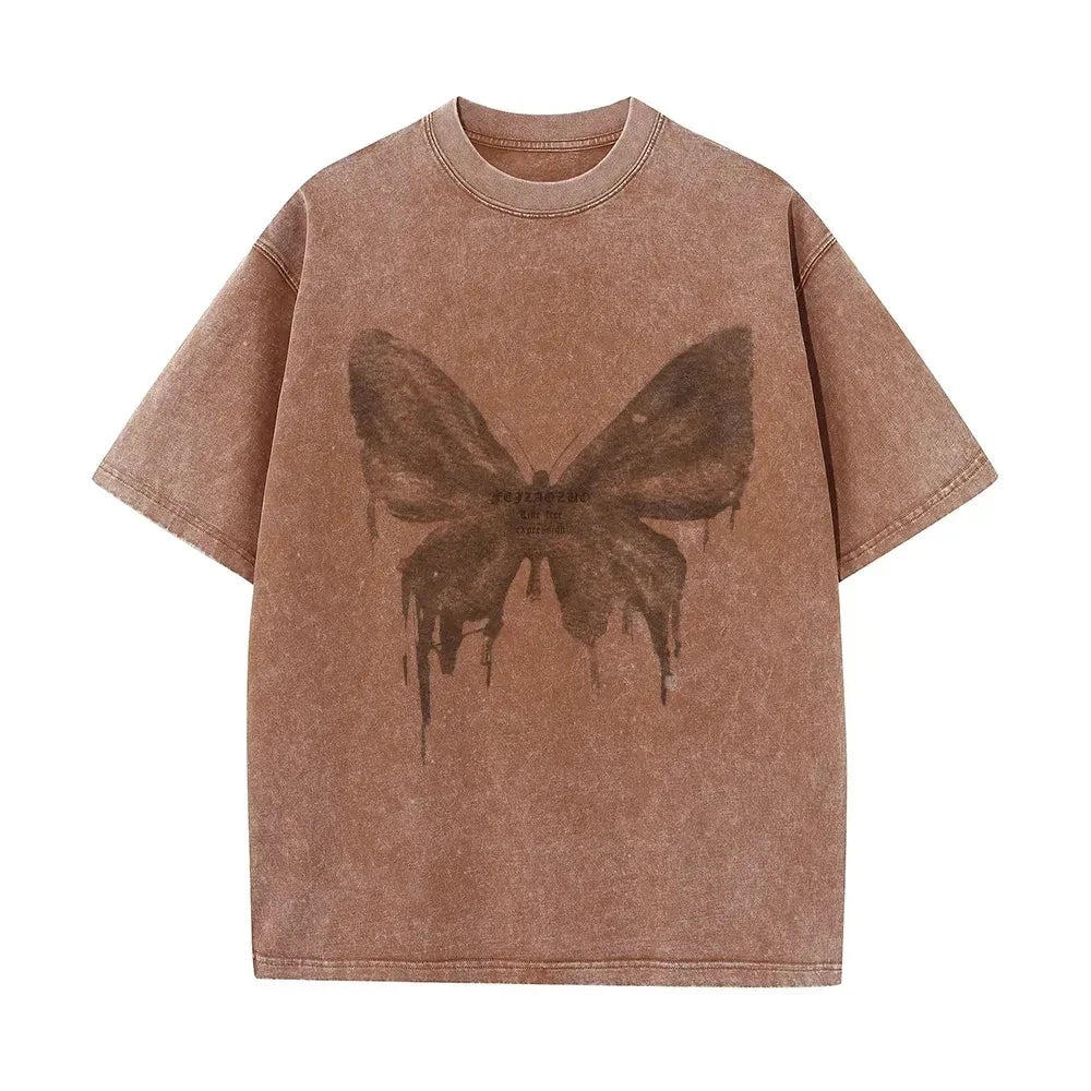 Close-up of a vibrant butterfly graphic on a women's soft cotton print shirt. Casual and stylish top.