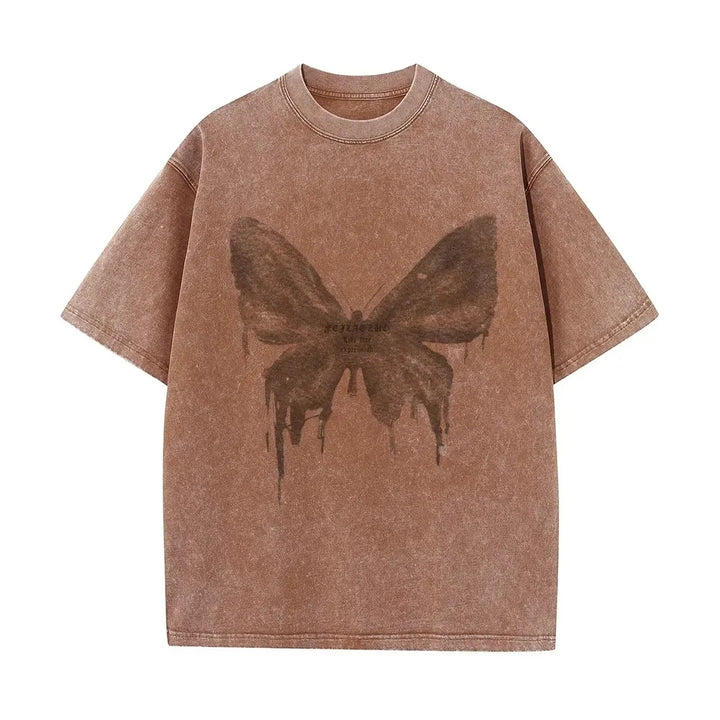 Close-up of a vibrant butterfly graphic on a women's soft cotton print shirt. Casual and stylish top.