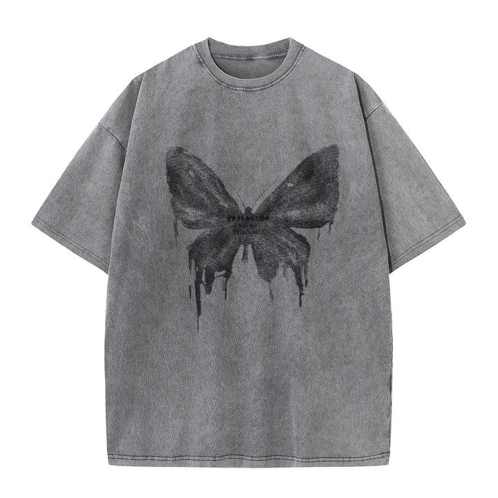 Woman wearing a comfortable butterfly print cotton tee, ideal as a stylish graphic summer top for casual outings.