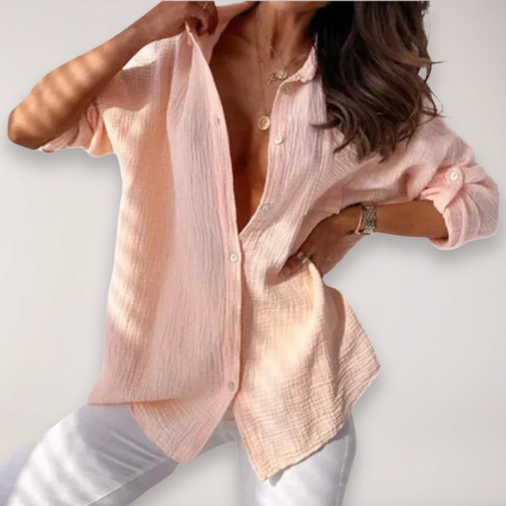 Women's stylish button-front blouse with roll-up long sleeves, perfect for casual wear or office attire.