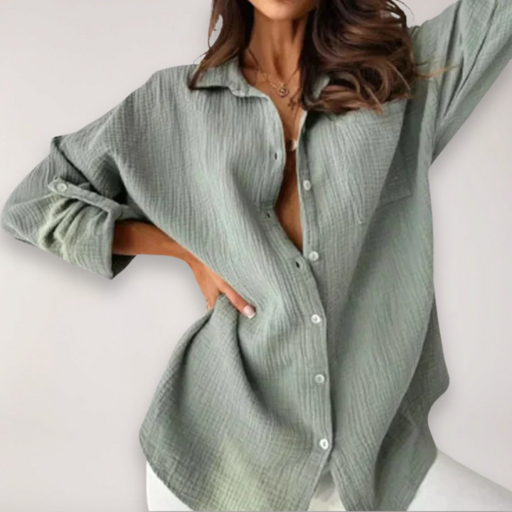 Ladies' fashion long-sleeve button blouse, a stylish top with practical roll-up sleeves for modern women.