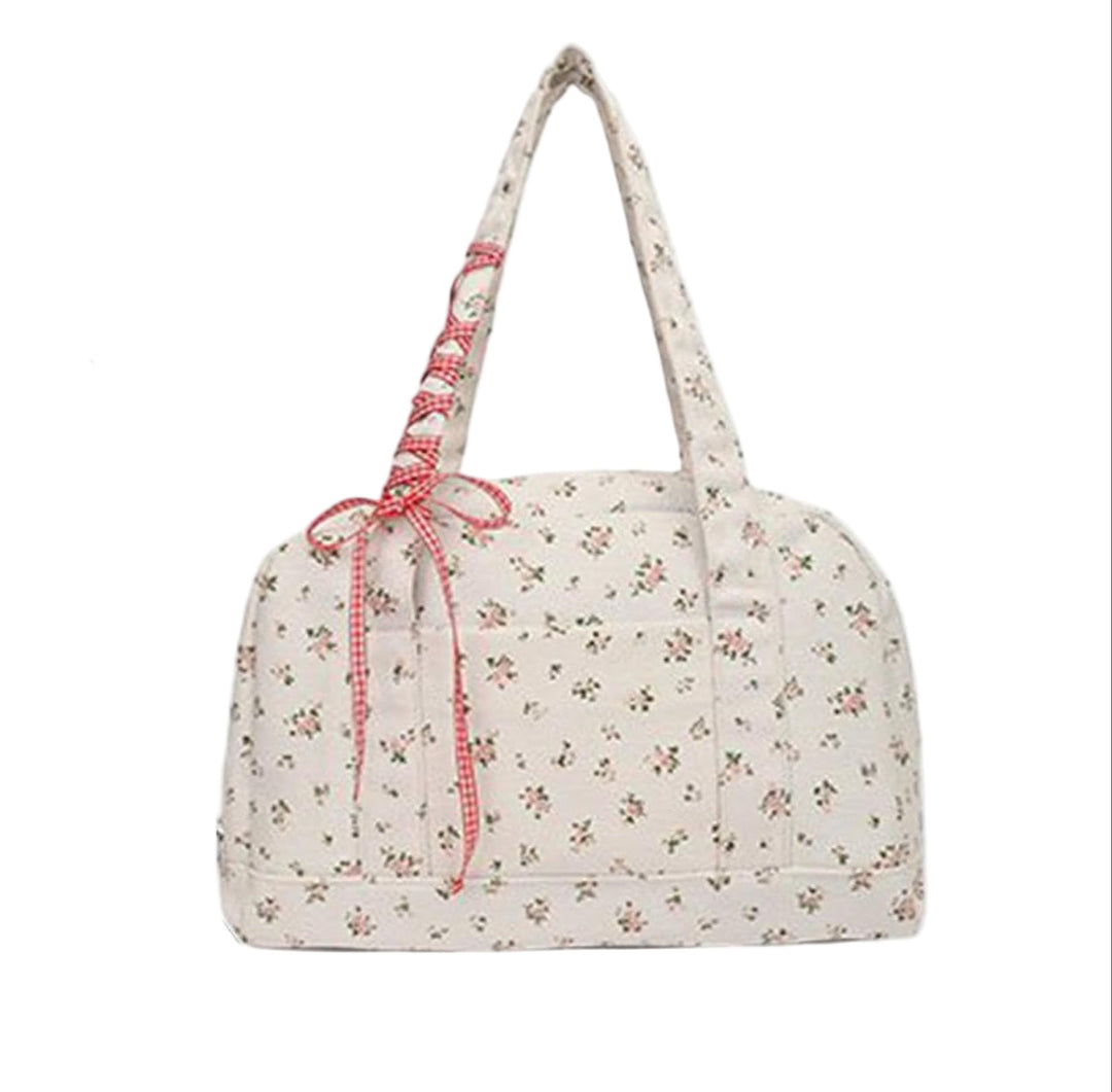Large canvas duffle bag for women, Floria weekender with prominent bow detail, travel essential