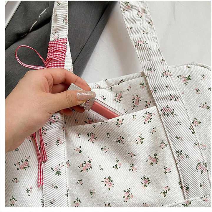 Front view of Floria large canvas bow duffle bag, women's stylish weekender for travel