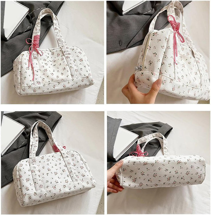Side view of women's canvas weekender bag, large duffle with a elegant bow accent, travel