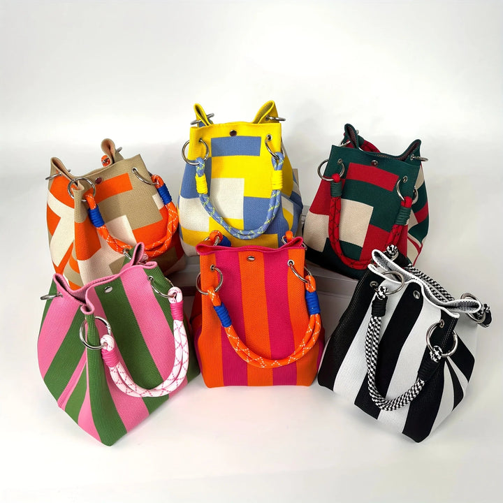 Durable canvas mini bucket bag for women. Unique stylish design, great compact shoulder & crossbody fashion accessory.