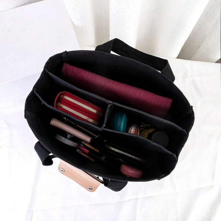 UrbanGrace women's canvas tote bag: stylish, durable, and features a secure zipper closure for daily essentials.