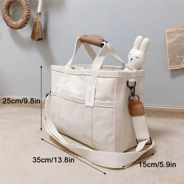 Versatile canvas tote bag for women, ideal for shopping, work, or travel. Durable with secure zipper.