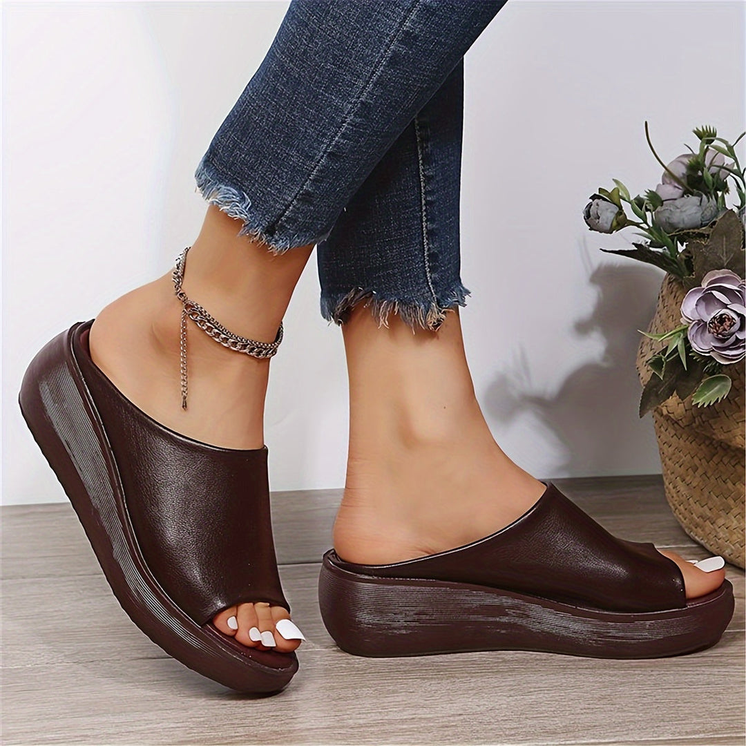 Casual women's stylish sandals paired with summer attire, offering lightweight comfort for any day.