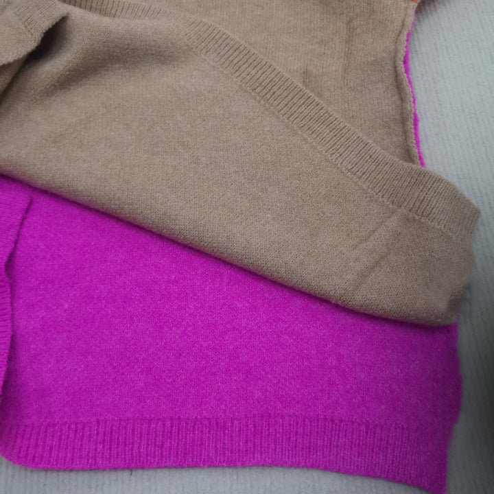 Trendy women's color block knitted sweater. Chic long sleeve top for fall fashion & winter style.