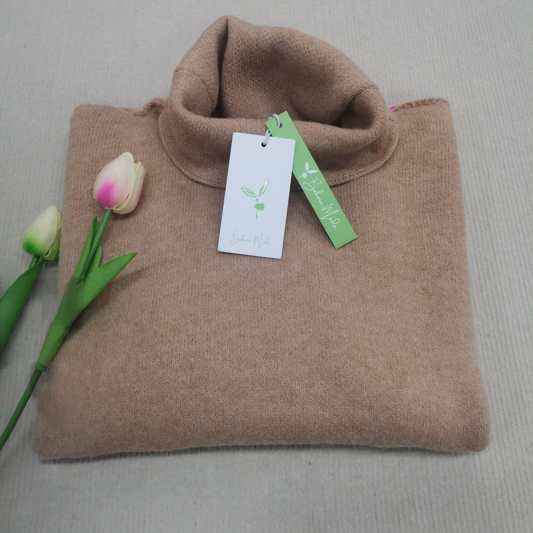 Comfortable and stylish color block knitted sweater. Women's long sleeve top for fall & winter outfits.