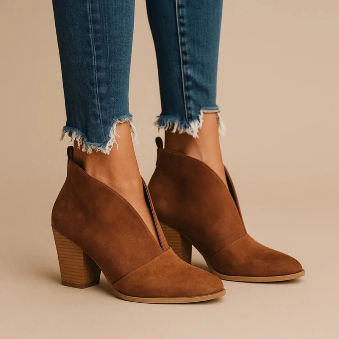 Women's stylish comfortable ankle booties, perfect for everyday wear. Chic slip-on design for versatile fashion.