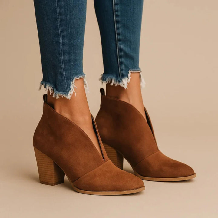 Women's stylish comfortable ankle booties, perfect for everyday wear. Chic slip-on design for versatile fashion.