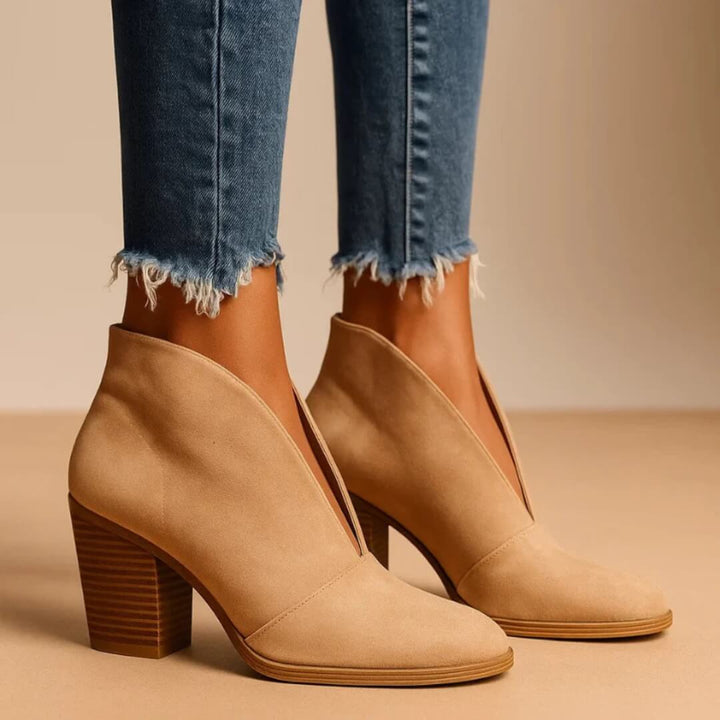 Chic women's ankle boots. Stylish autumn & winter booties with a comfortable slip-on design for everyday fashion.
