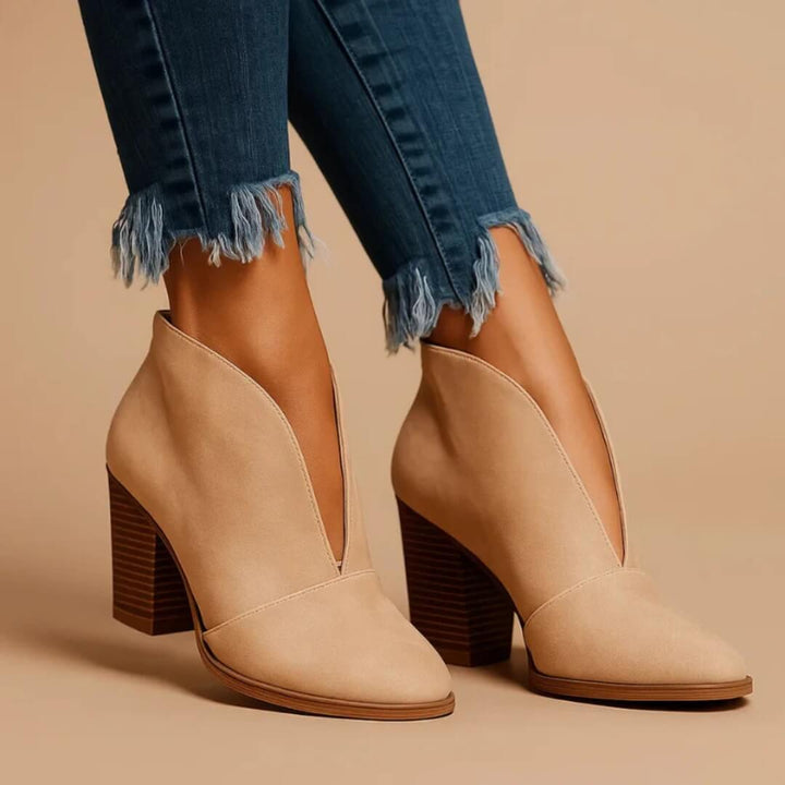 Modern women's ankle booties. Comfortable & stylish slip-on boots for all-day wear, versatile for autumn/winter fashion.