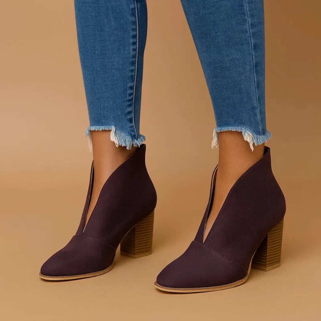 Stylish women's ankle boots featuring a comfortable slip-on design. Chic and versatile booties for everyday fashion.