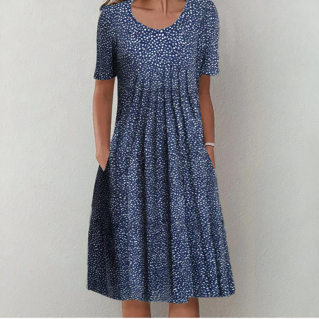 Elegant women's summer day dress. Comfortable cotton midi for casual wear or vacation. Lena style.