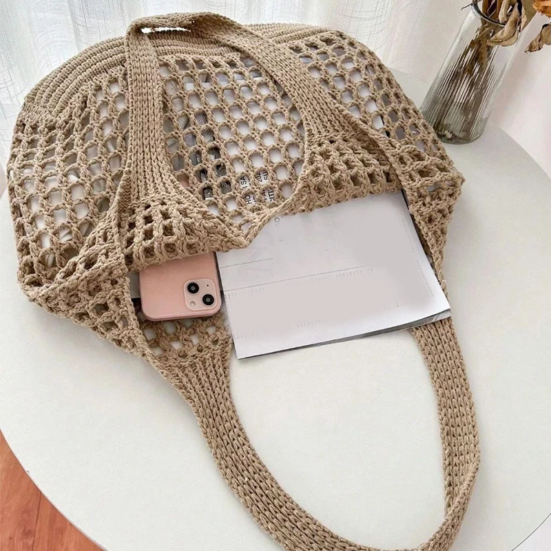 Stylish women's accessory: hand-knitted crochet carryall tote bag. Perfect for summer.