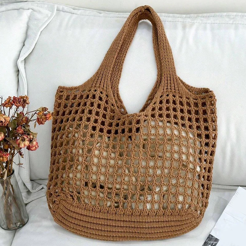 Elegant crochet beach bag, a spacious carryall tote for your seaside essentials.