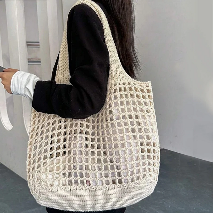 Hand-woven crochet tote bag for women, ideal for beach trips & summer style.
