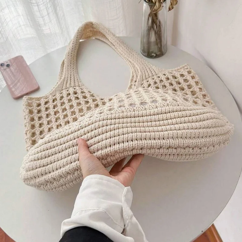 Chic crochet woven tote bag, an elegant summer accessory for stylish women.