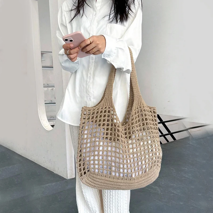 Everyday crochet shoulder bag, doubles as a chic beach or market carryall tote.