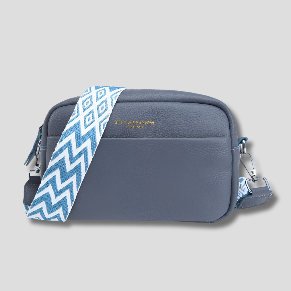 Elegant women's shoulder bag with geometric strap. Organized interior, perfect for everyday style.
