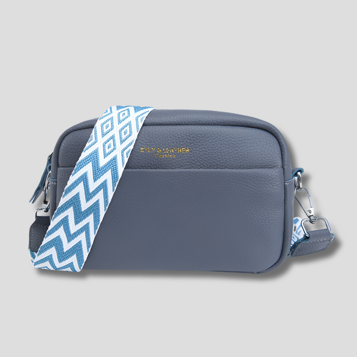 Elegant women's shoulder bag with geometric strap. Organized interior, perfect for everyday style.