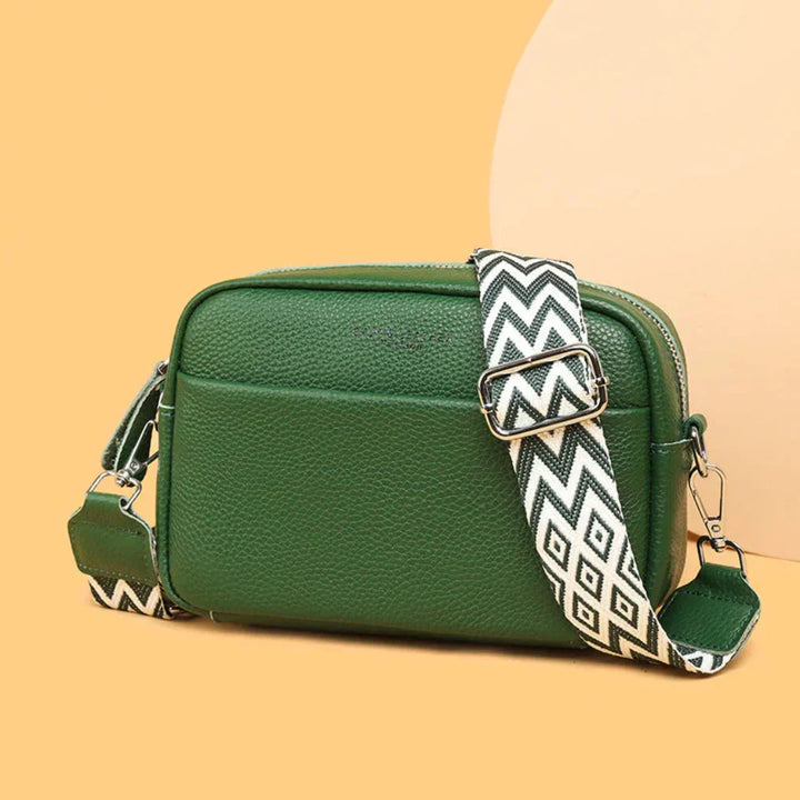 Fashionable women's crossbody bag with striking geometric strap. Detachable, versatile for any outfit.
