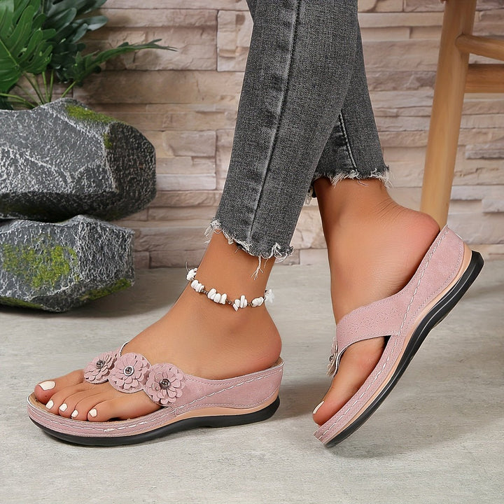 Stylish floral pattern platform wedge sandals for women. Ideal casual summer thong footwear, comfortable.