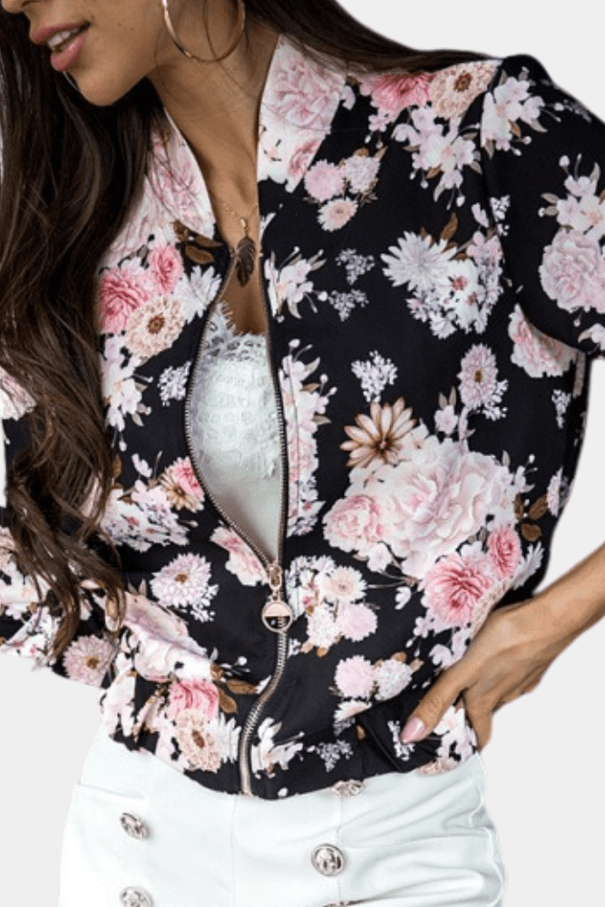 Fashionable women's floral stretch jacket designed for movement & comfort. Stylish spring/fall active outerwear.