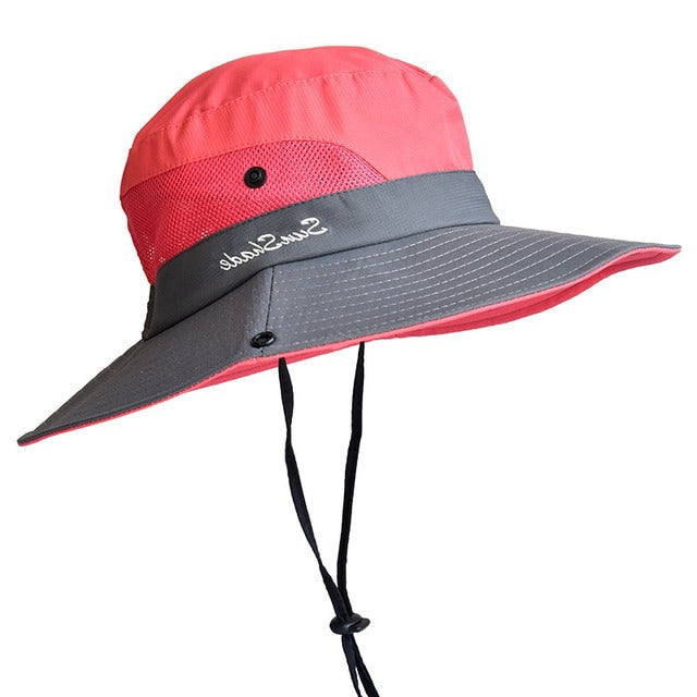 Stylish women's wide-brim foldable sun hat offering excellent UV protection, great for beach, travel, and summer adventures.