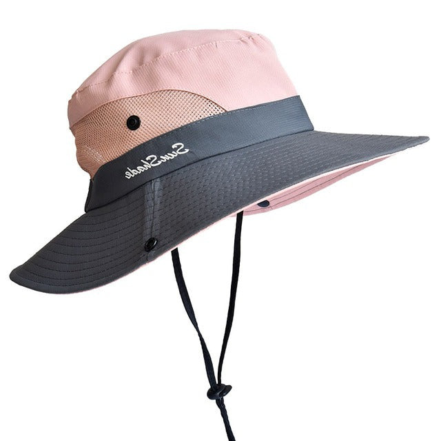 Chic women's foldable UV protection sun hat with wide brim, designed for ultimate sun shield during summer travel and beach days.